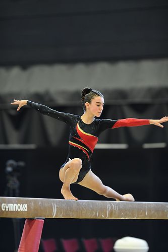 Addisyn Smith competing at NZ Gymnastics Championships on the Beam where she won a gold medal. 