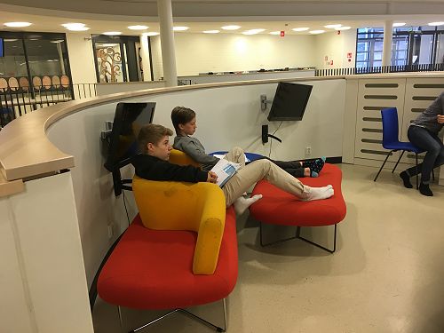 Older students utilising the open staircase spaces 