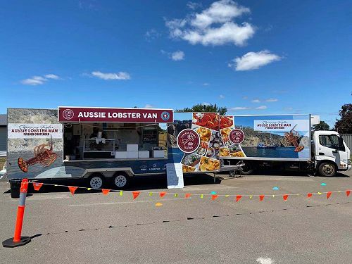 Michael Blake is taking cooked lobsters to the people. 