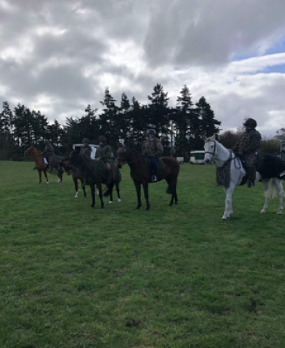 Columba riders stay warm as rain clouds loom