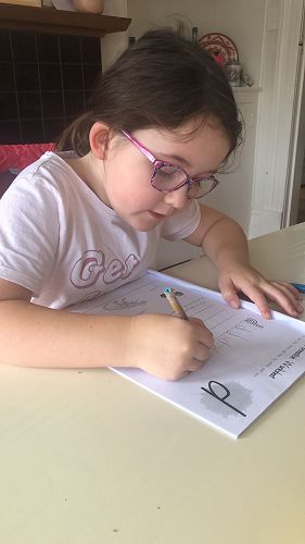 Florence Woodham (Year 2) practicing writing her letters
