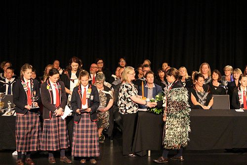 Teghan Bain receives a prize