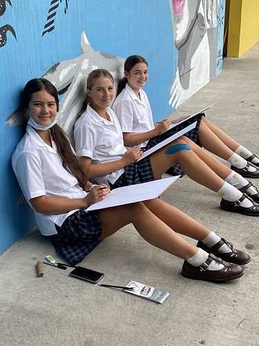Year 11 students outside to draw native plants