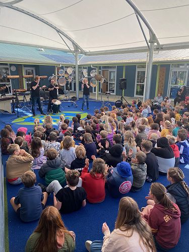 Trying to clap the beats being played on the drum - it got harder and harder!