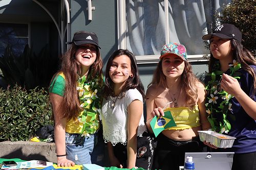 Students sell Brazilian food as part of cultural diversity week.