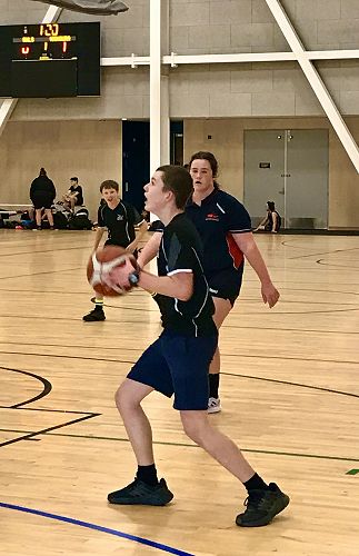 Max eyes up the hoop.