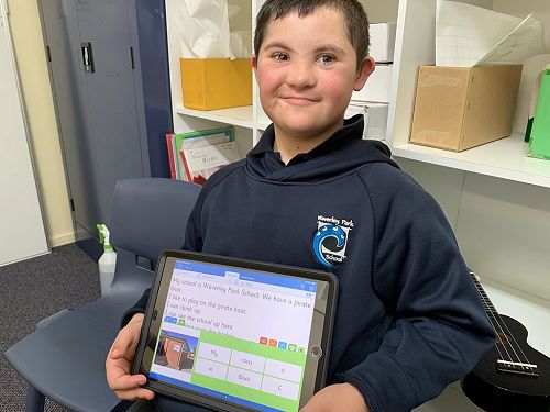 Mahtel proudly showing his work on Clicker