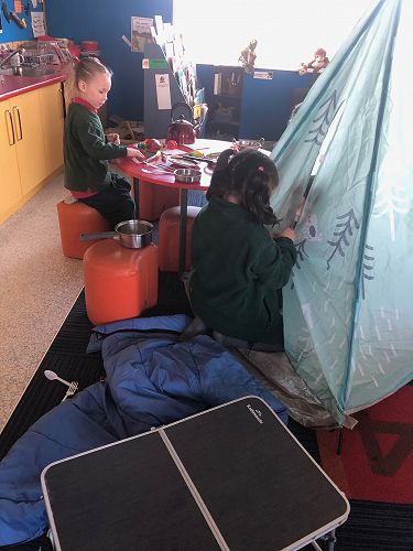 Camping outside so we can see the night sky.