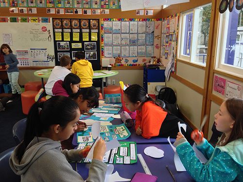 Cutting, sticking, trimming...final details.