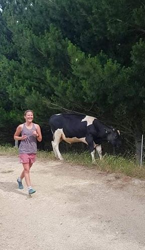 Laura running on her farm, training for the Pauanui event.