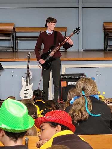 Zach MacMillan performing 'Sweet Child of Mine' on Bass - Waimataitai Kura