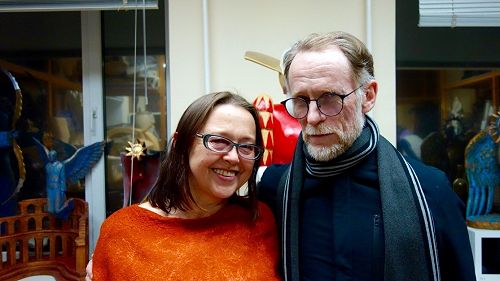 Museum director Elena Lisina and David Howard at the studio of Dimitry Potapov. 