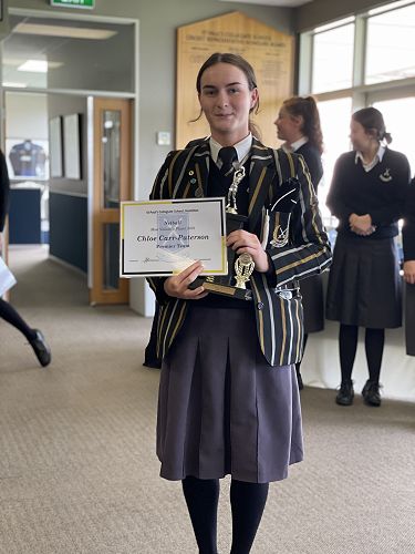 Chloe Carr-Paterson celebrates as Most Valuable Player