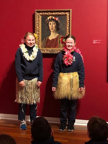 Emmi Murray and Meg Bowmar demonstrating the way costumes can present a message.
