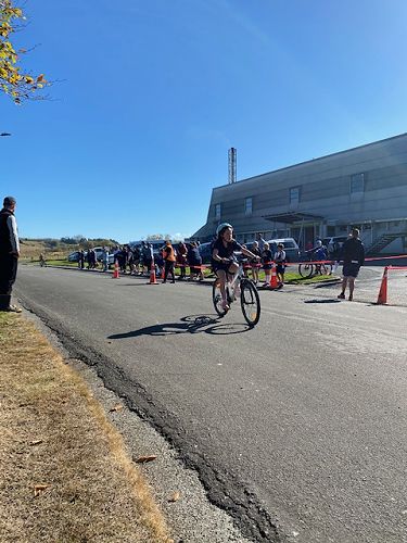 Arielle Dar completing the 6km bike leg of the course