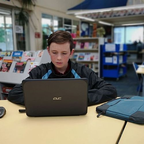 Oliver Mackean and his ASUS VivoBook E201NA.