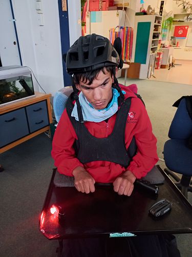 Salih enjoyed looking at bicycles up close. He was particularly keen on wearing the helmet and the assortment of lights that riders wear!