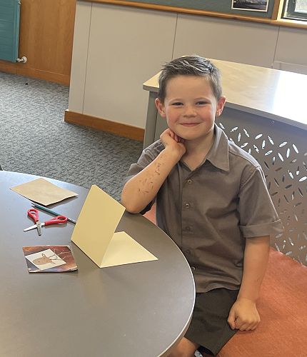 Years 0-3 making their creations.