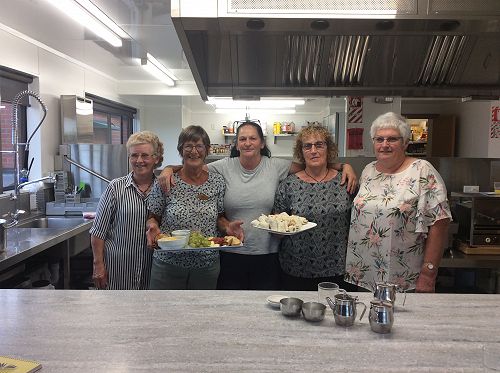 Kitchen staff in their refurbished space