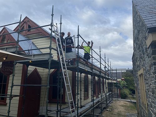 Scaffolders at work on the hall