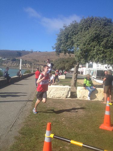Nic Taylor completes the run leg to secure second position for the Senior A team