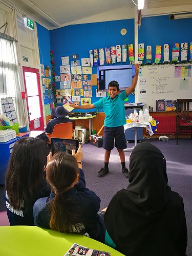 Ransi writing a sentence in 'code' (semaphore)