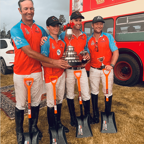 Zachary (second from left) and polo team
