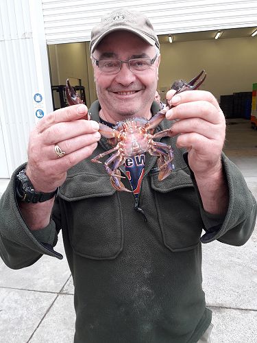 Grant Walker with the catch of the day in Auckland.