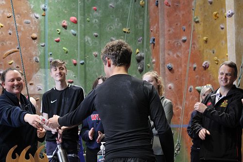 Hunter Wilson receiving a spot prize. 