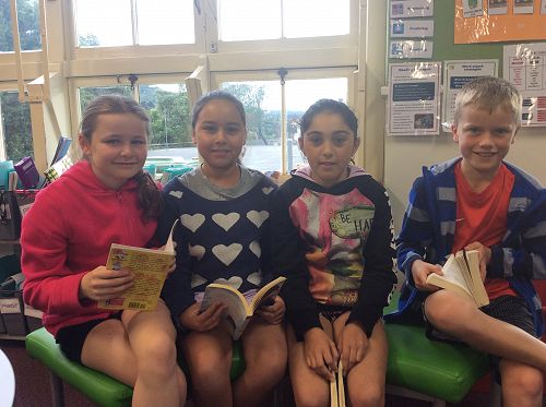 (L-R) Omea, Jasmine, Kaylea and Sam put in some 'study' for the recent Literacy Quiz.