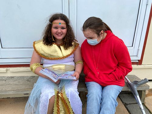 Iris reading with Isabelle