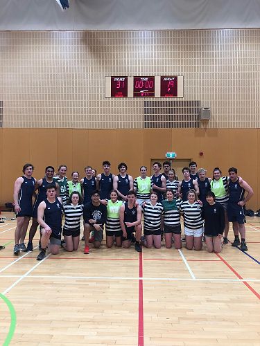 The senior Boarders team along with the Otago Boys Hostel senior team after their victory win in the annual netball match for the Garfield cup.