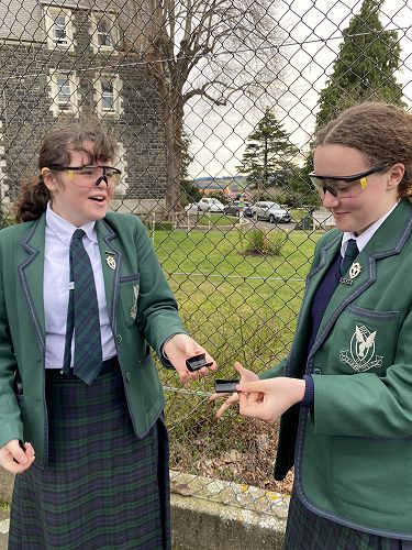 Orla and Charlotte with the split canister