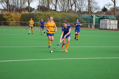 Charli sprinting to score a goal