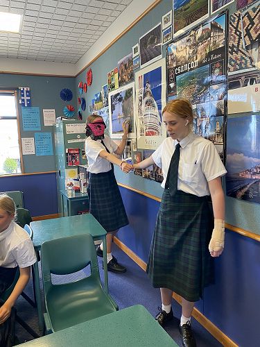 Two young girls find their way around the maze. Amelia Hollows would have used informal language with her friend Lucy Morrison.