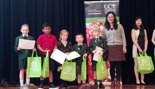 Ruby Panton, Liam Mao and Leo Mundy receiving their awards