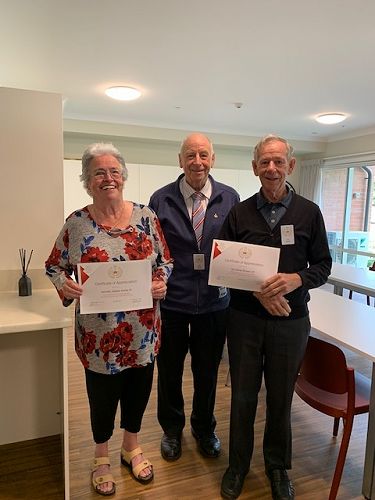 20 yr certificates presented to Jennifer Yorke and Ian Brown by Registrar Ken Shields