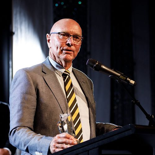 Peter Gilbert accepts his award for Outstanding Contribution to Sport Award