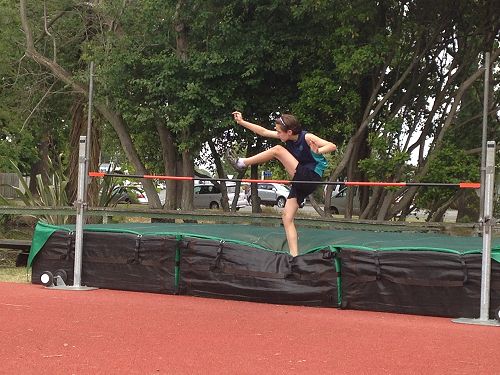 Daniella Daprini clearing the bar.