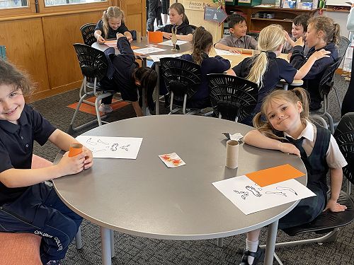 Years 0-3 making their creations.