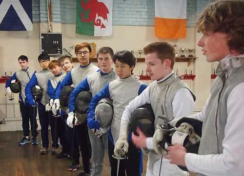 The McGlashan fencers suited up with weapons, masks and lamés.