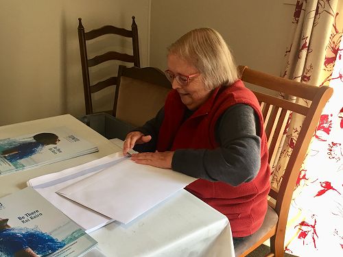 Kathy Mayo packing the December 2022 issue on 28 November.