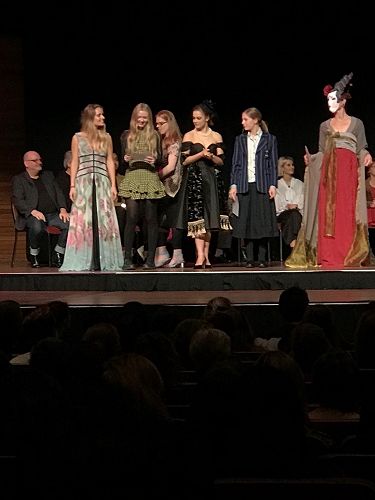 Ivy receives her award in Wellington (to her right is her winning design).