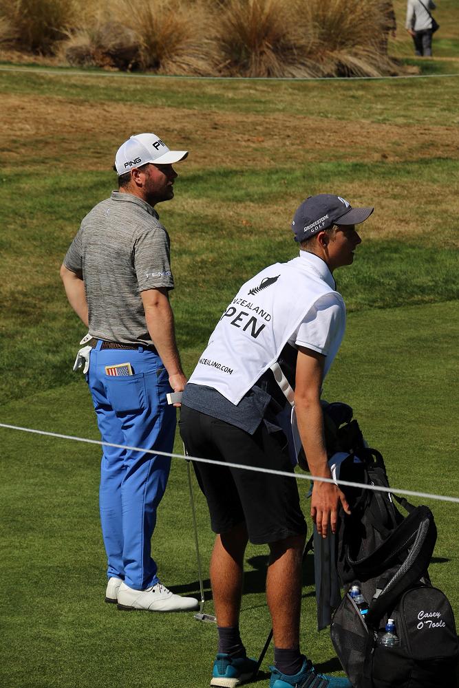 Callum White caddying the NZ Golf Open