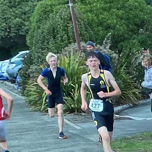 Representing King's in the U16, Dan Kelleher (left) is shown sprinting in the last leg of the South Island Secondary Schools Triathlon