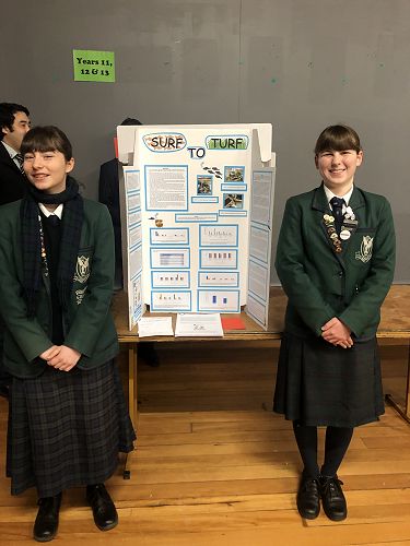 Returning champions Olivia Charles and Maia Robertson present the work they completed to earn a Silver Crest badge