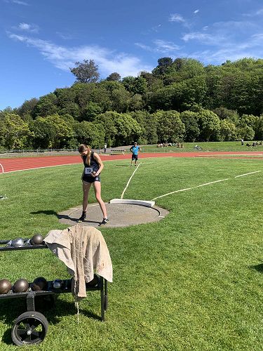 Alex prepares to throw (shot put)