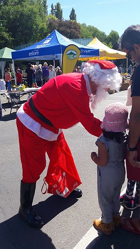 Even Santa loves the GI Market day.  Dec 2017.  