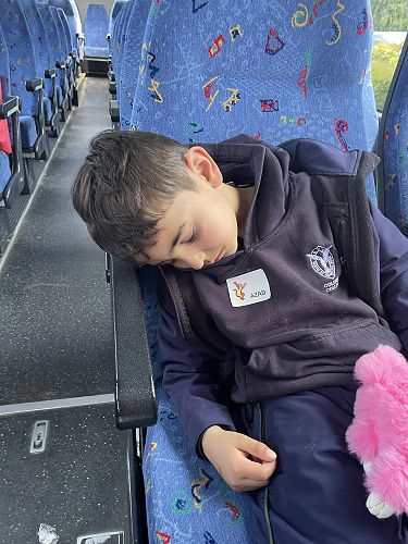 Azad on the bus ride home after a fun filled day.