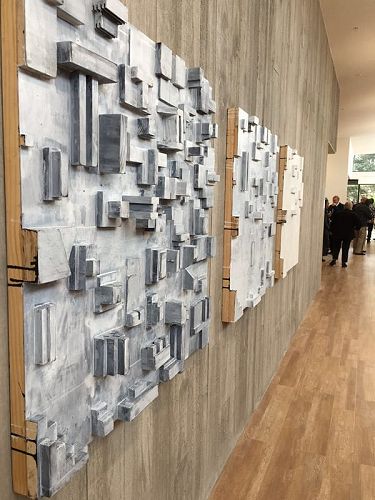 Samer Hatam's mixed media, "Urbanisation I, II and III"